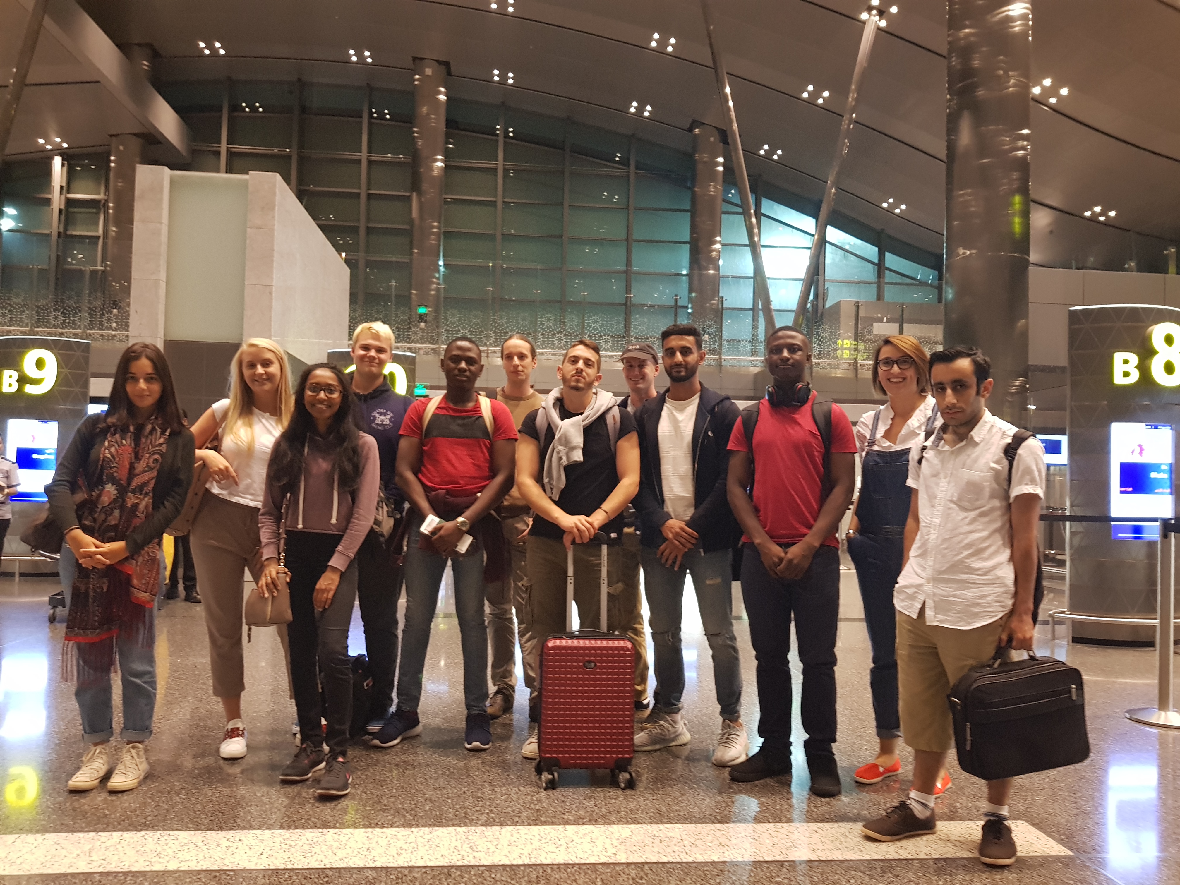 Business School and Engineering students at the airport, ready for their trip to Malaysia.
