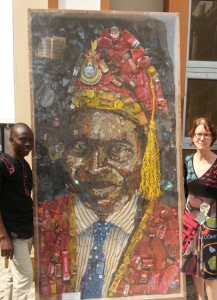 Artist Durodola Yusuf, his recycled picture of the DVC and Professor Stephanie Newell