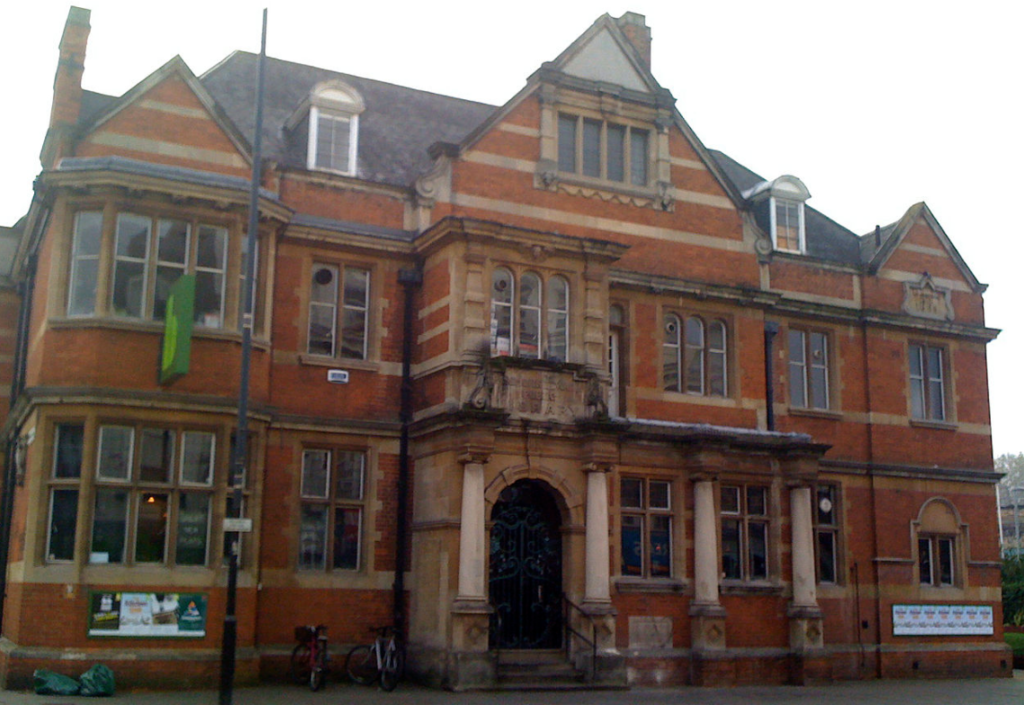 Late 19th century red brick facade of Shepherds Bush Public Library