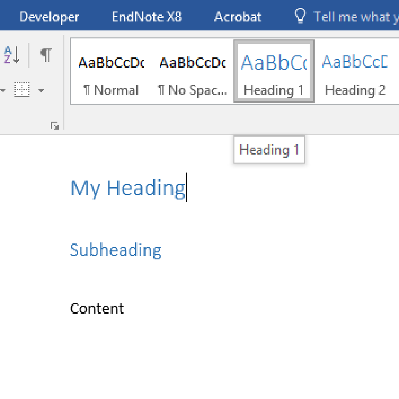 Applying a Heading 1 style to the main document heading.