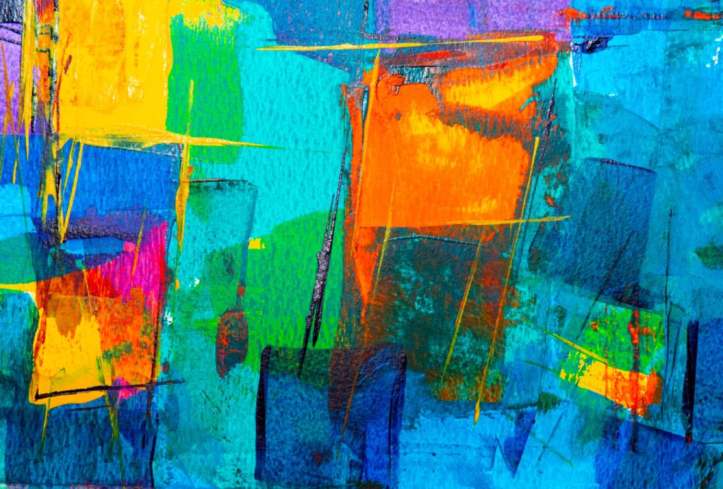 An abstract painting of different shapes and colours and brush strokes coming together to represent being present to one another's differences. 