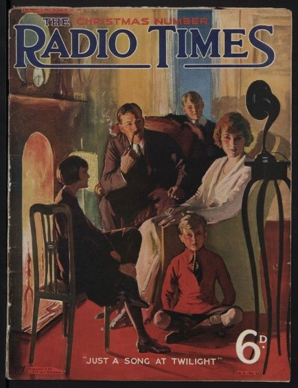 December 1923, issue number 13 of the Radio Times with a colour illustration of a smartly dressed family sitting by the fire listening to Love's Old Sweet Song/Just a Song at Twilight on the wireless.