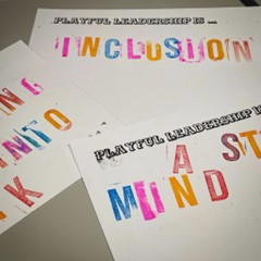  three overlapping cards with "Playful Leadership is..." printed at the top and various text hand printed in bright colours underneath, including: Inclusion and A State of Mind