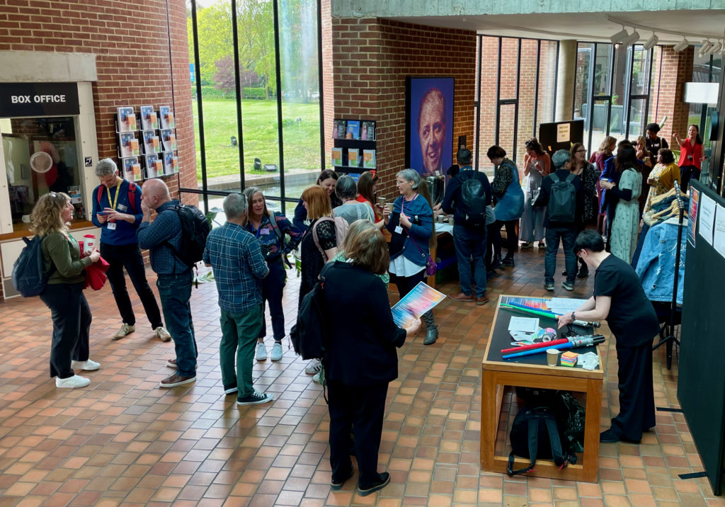 Crowd of people in lobby of the ACCA building 
