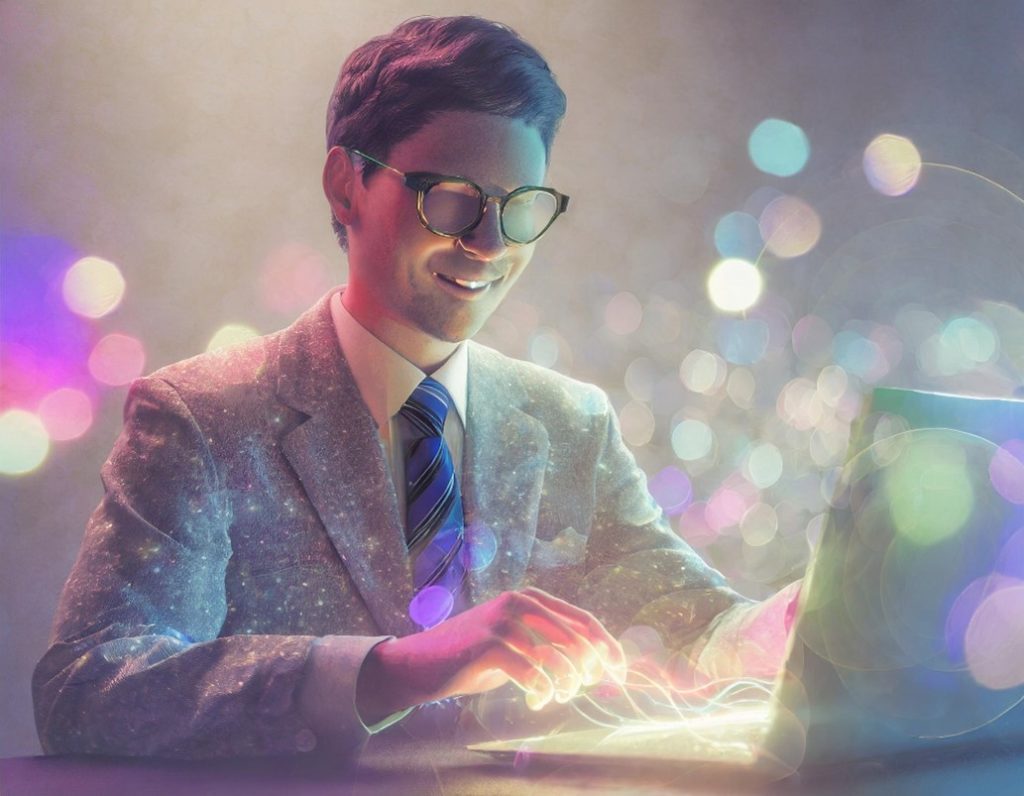 An AI-generated image of a man in a suit and glasses, using a laptop. Blobs of coloured light float about. He has no eyes, probably because this is an AI image.